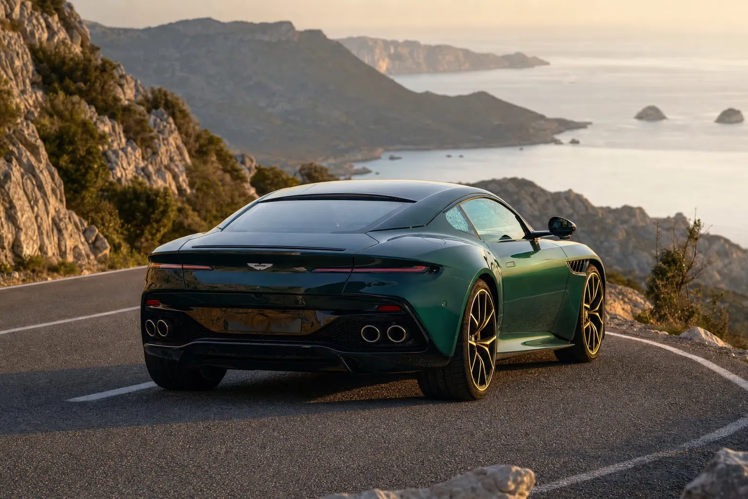Aston Martin Vanquish su strada costiera in Sardegna