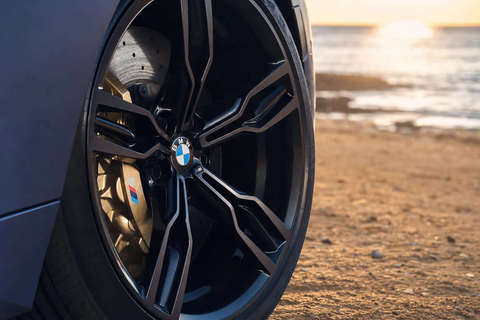 Wheel and brake caliper detail of the BMW M8 Competition Gran Coupé