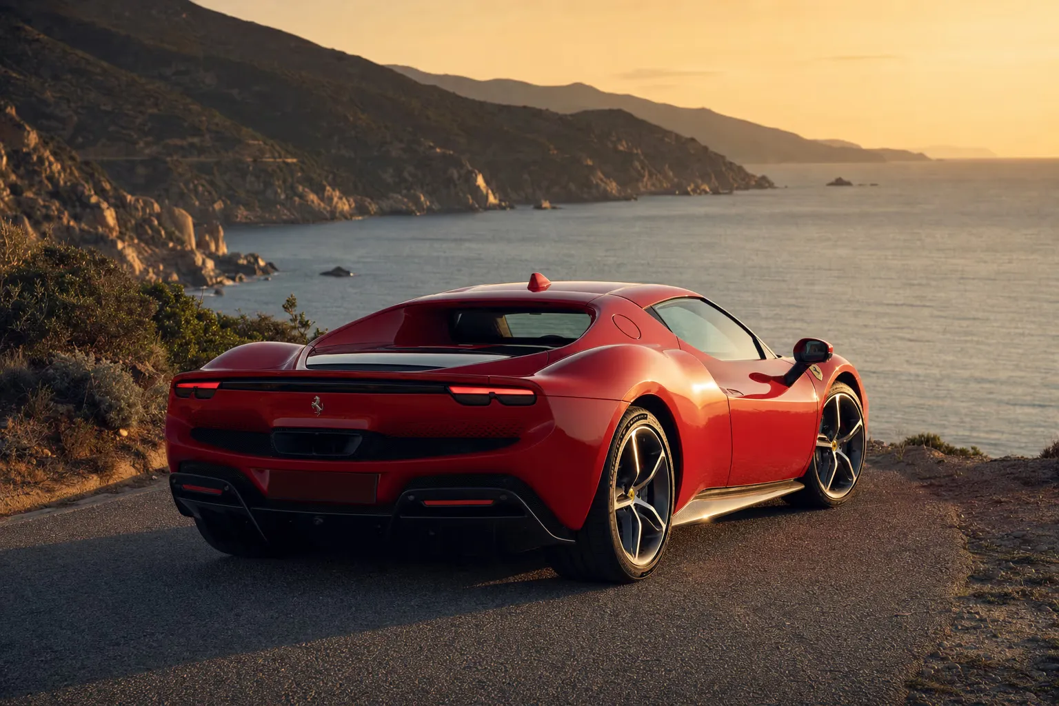 Ferrari 296 GTB su strada costiera in Sardegna