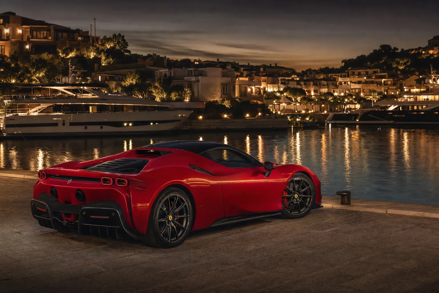 Ferrari SF90 Stradale at night in an exclusive Sardinian marina