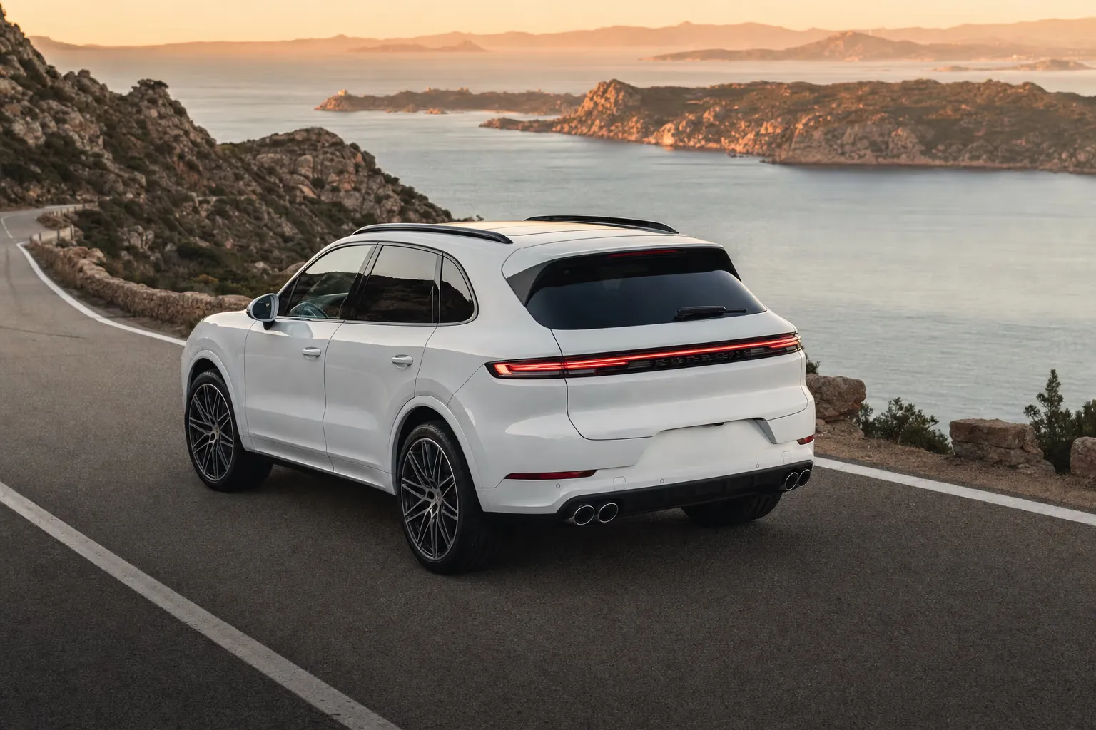 Porsche Cayenne on a Sardinian coastal road
